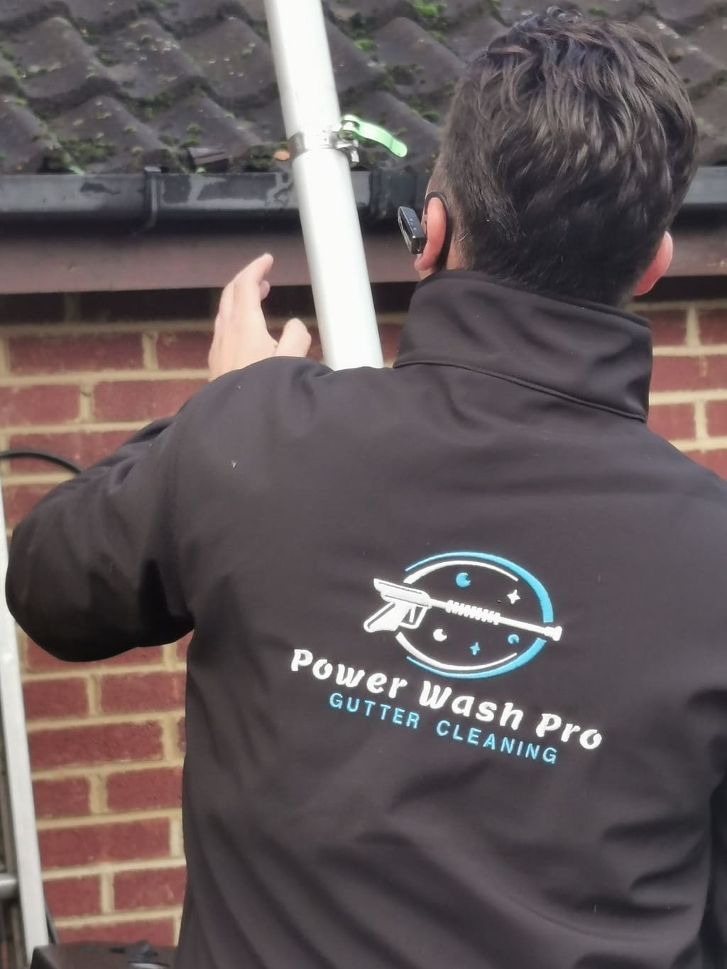 Gutter cleaning on 18th century Long Crendon cottage
