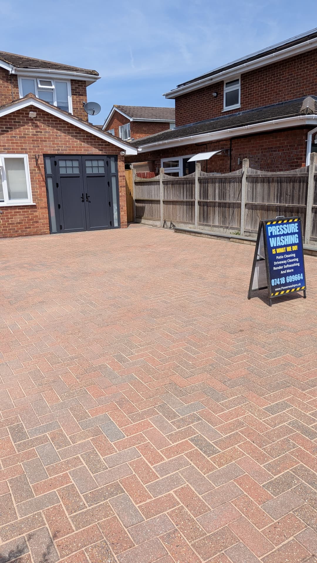 Freshly cleaned block paving driveway in Oxfordshire & Bucks with Power Wash Pro signage