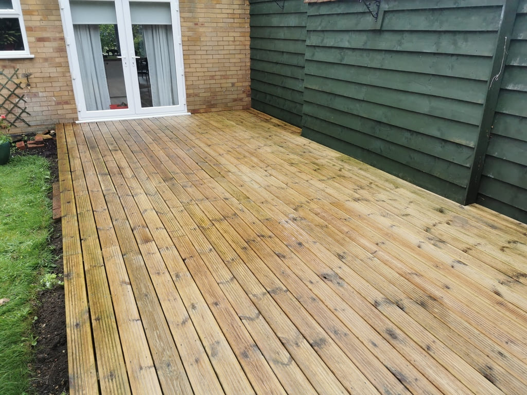 Softwood decking in Thame after being restored from a slippery, algae-covered state