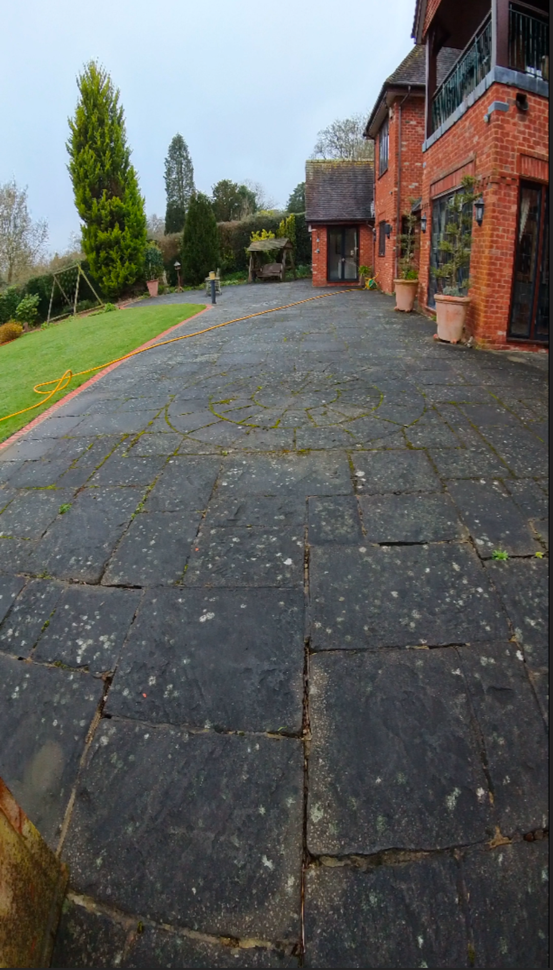 Why Patios in Marlow turn black after winter (and how to fix it)